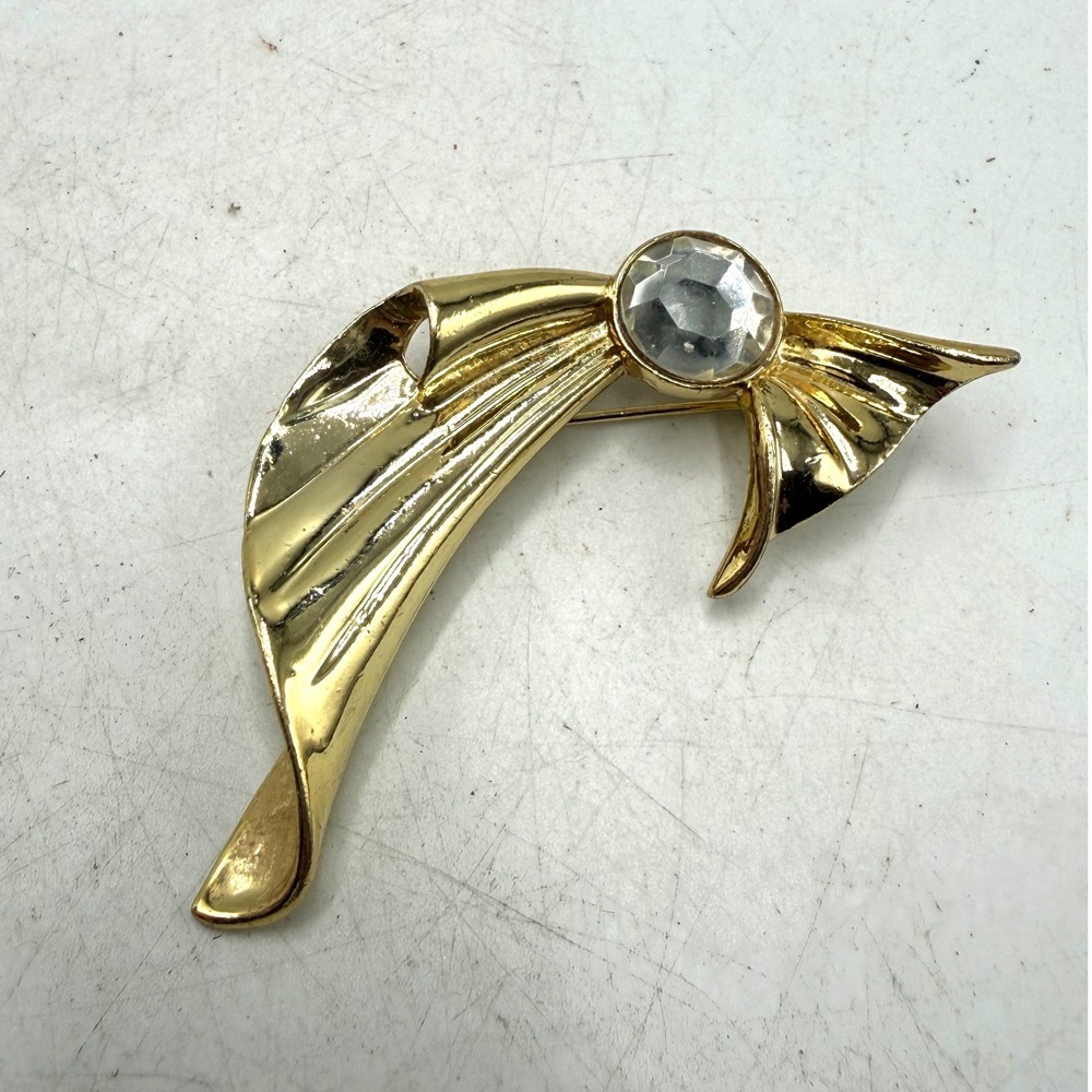 Vintage Gold Tone Abstract Ribbon Brooch with Large Clear Faceted Rhinestone
